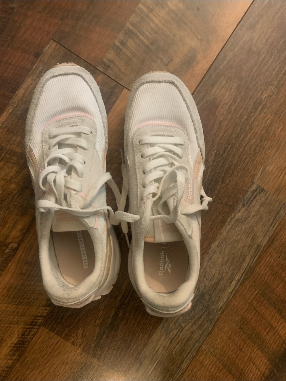 Reebok Women’s White Sneakers with Light Pink Accents